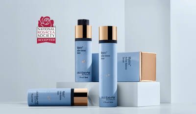 Four skinbetter science products—two tall pump bottles, one medium bottle with gold cap, and a small square jar—arranged on white and pale-blue geometric pedestals. A red 'National Rosacea Society Accepted' badge floats in the top left corner.